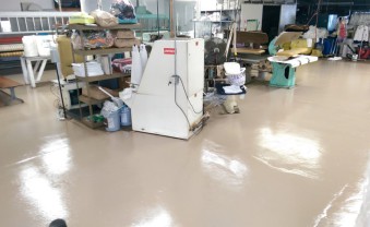 Valley Laundry commercial pressing and finishing equipment inside the Franklin, Ohio facility